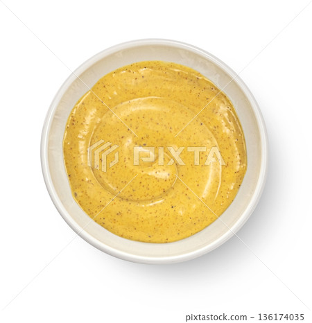 Mustard sauce swirl in ceramic bowl isolated on white background, full depth of field, top view Mustard sauce swirl in ceramic bowl isolated on white background, full depth of field, top view 136174035