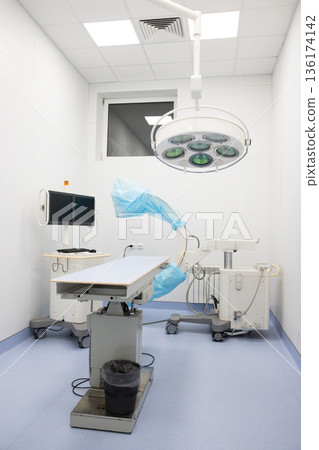 New Fluoroscope, C-arm in protective case with television to broadcast in modern vet clinic, 136174142