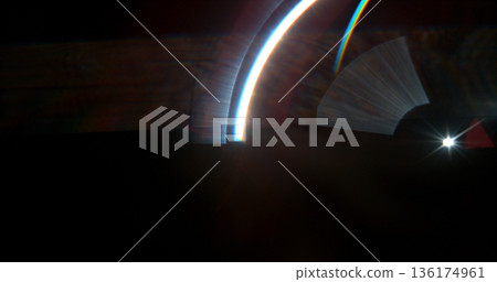 Abstract cinematic lens flare with bright light burst and star rays, isolated on black background. Optical light effect ideal for VFX overlays, transitions, titles and dramatic visual accents. Abstract cinematic lens flare with bright light burst and star rays, isolated on black background. Optical light effect ideal for VFX overlays, transitions, titles and dramatic visual accents. 136174961