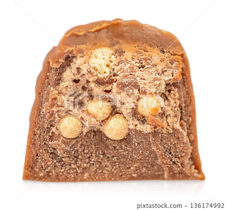 Chocolate candy cross section with nut and crispy filling isolated on white 136174992