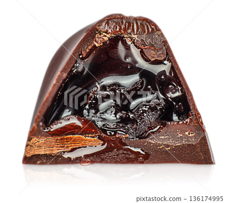 Chocolate candy cross section with liquid chocolate filling isolated on white 136174995