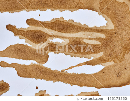 Spilled coffee, long vertical streaks, uneven brown texture, drops of different sizes. Spilled coffee, long vertical streaks, uneven brown texture, drops of different sizes. 136175260