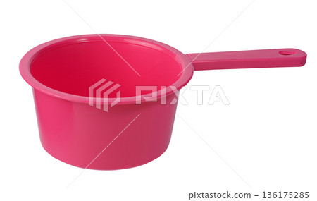 Plastic kitchen ladle of bright pink color with long handle, isolated background Plastic kitchen ladle of bright pink color with long handle, isolated background 136175285