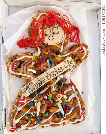 Danish birthday pastry in decorative human shape 136175393
