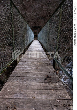 A suspension bridge over the source of the Arakawa River in Okuchichibu in winter A suspension bridge over the source of the Arakawa River in Okuchichibu in winter 136175768