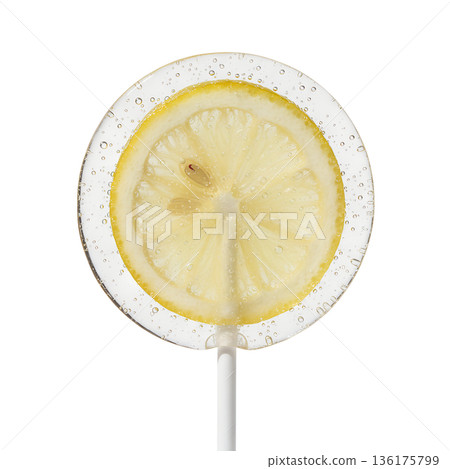 Refreshing, translucent lollipop with a real lemon slice inside, isolated on a stick. Sweet-and-sour summer treat or unique candy concept Refreshing, translucent lollipop with a real lemon slice inside, isolated on a stick. Sweet-and-sour summer treat or unique candy concept 136175799