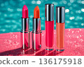 Colorful Lipsticks and Lip Gloss on Sparkling Background 136175918