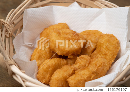 Image of chicken nuggets served in a basket Image of chicken nuggets served in a basket 136176197