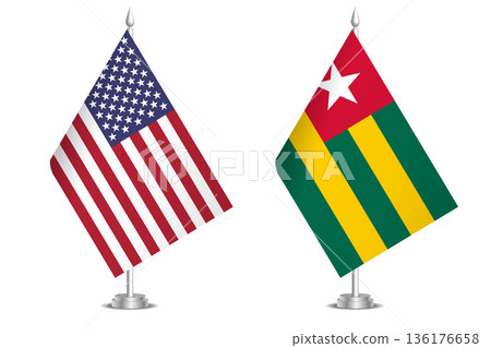 Flags of United States and Togo. The concept of partnership and joint action. Symbol of partnership, cooperation, international collaboration, peaceful negotiations, alliance, bilateral communication Flags of United States and Togo. The concept of partnership and joint action. Symbol of partnership, cooperation, international collaboration, peaceful negotiations, alliance, bilateral communication 136176658