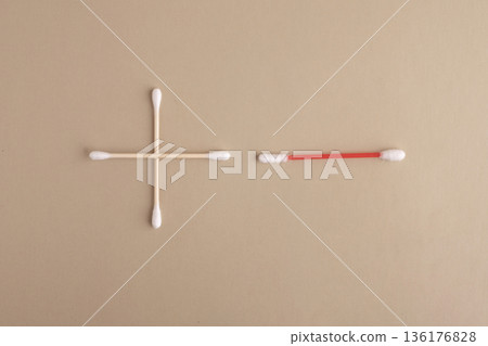 Comparison of reusable and disposable cotton swabs on neutral background Comparison of reusable and disposable cotton swabs on neutral background 136176828