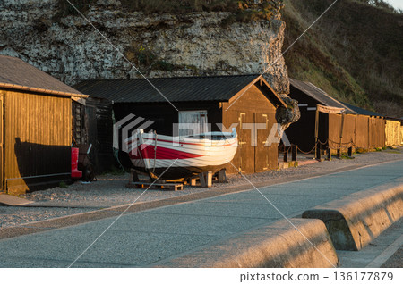 Boats and Beach of Etretat at Sunset Boats and Beach of Etretat at Sunset 136177879