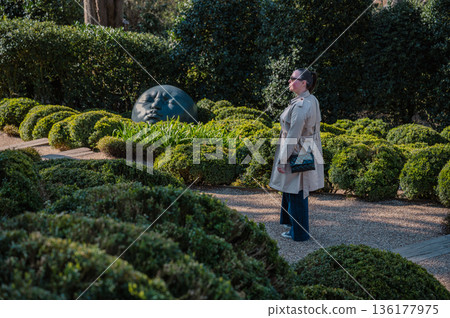 Woman in Jardins d'Etretat 136177975