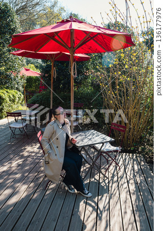 Woman in Jardins d'Etretat 136177976