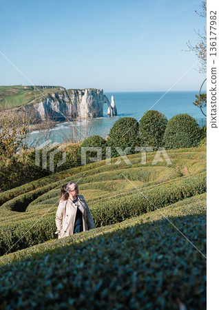 Woman in Jardins d'Etretat 136177982