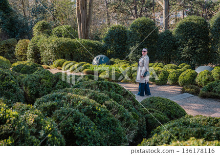 Woman in Jardins d'Etretat 136178116