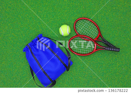 Two tennis rackets and a tennis ball 136178222