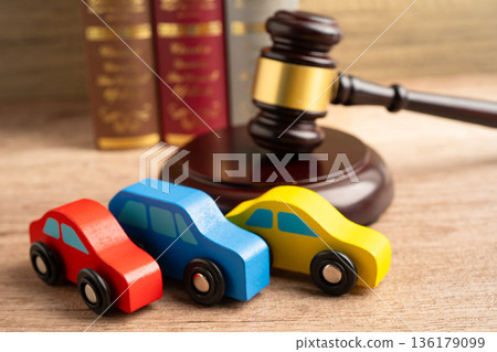 Hammer gavel judge with car vehicle accident, insurance coverage claim lawsuit court case. Hammer gavel judge with car vehicle accident, insurance coverage claim lawsuit court case. 136179099