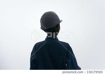 Silhouette of a woman in work clothes Silhouette of a woman in work clothes 136179569