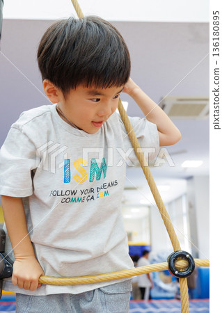 Boys playing indoors Boys playing indoors 136180895