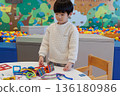 Boy playing with educational toys 136180986
