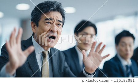 A senior Japanese boss shouts in anger at an unreasonable request 136182091