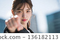 A Japanese female employee announcing the start of a new project 136182113
