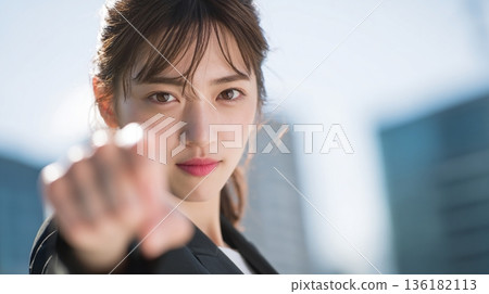 A Japanese female employee announcing the start of a new project 136182113