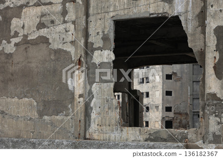 The ruined concrete walls of Gunkanjima The ruined concrete walls of Gunkanjima 136182367