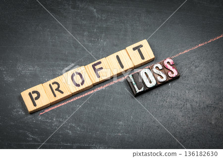 PROFIT Versus LOSS Financial Outcome Comparison Shown With Wooden Letter Blocks PROFIT Versus LOSS Financial Outcome Comparison Shown With Wooden Letter Blocks 136182630