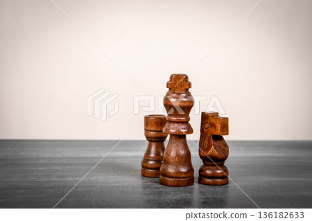 Leadership Power Concept With Chess King And Supporting Pieces Leadership Power Concept With Chess King And Supporting Pieces 136182633