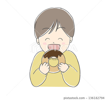 一個笑容燦爛的男孩正在吃甜甜圈。 136182794