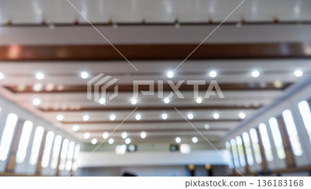 Blurred Abstract Background of Bright Indoor Hall Lighting 136183168