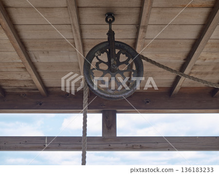 The silence of a rusty well pulley weaving history The silence of a rusty well pulley weaving history 136183233