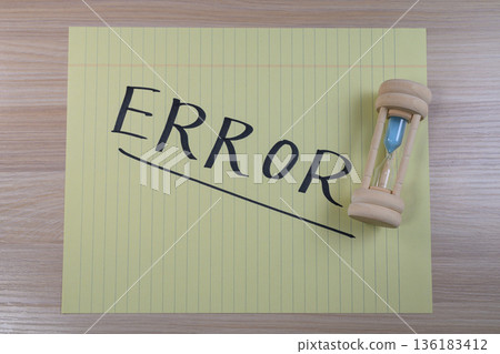 Error message and hourglass concept 136183412