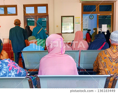 Portrait of many patients waiting for calls for medical examinations at a hospital in Yogyakarta, Indonesia on 05-27-2024 136183449