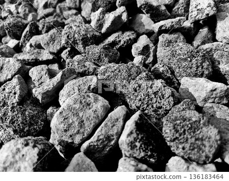 Black and white concept pebble stone background 136183464