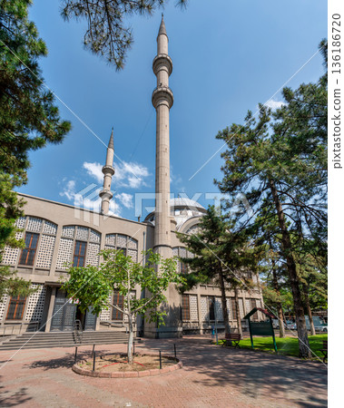 Eski Sanayi Camii mosque, a prominent landmark with its minarets and dome, under a clear sky in Kayseri, Turkey Eski Sanayi Camii mosque, a prominent landmark with its minarets and dome, under a clear sky in Kayseri, Turkey 136186720