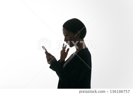 Surprised woman profile silhouette 136186757