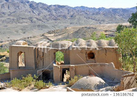 Iran, Silk Road, ruins near Yazd, Hanaq Citadel ruins, multi-story adobe building 136186762