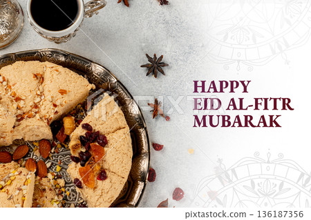 Celebration of Eid al-Fitr with sweets and coffee during Ramadan in a home setting 136187356