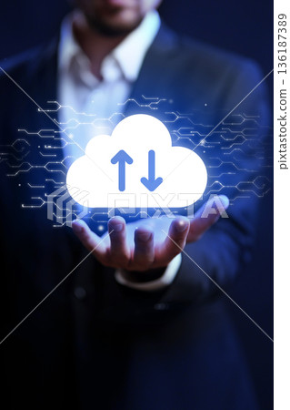 Holding a cloud symbol with upload and download arrows during a digital connection event Holding a cloud symbol with upload and download arrows during a digital connection event 136187389