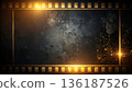 A heavy vintage movie film frame with a shining golden border 136187526
