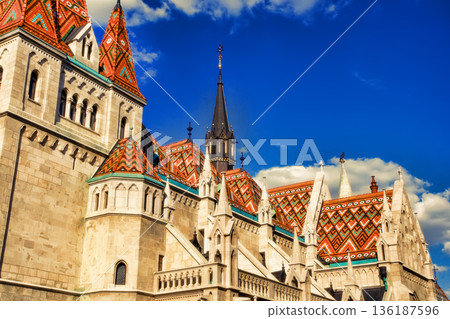 View to Matthias Church in the Castle District. Matthias Church is one of the most famous landmarks of Budapest. View to Matthias Church in the Castle District. Matthias Church is one of the most famous landmarks of Budapest. 136187596