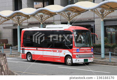 A Keihan Bus compact car stopping in front of Yamashina Station A Keihan Bus compact car stopping in front of Yamashina Station 136188170