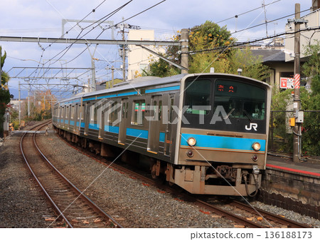 205 series train arriving at Inari Station on the Nara Line 205 series train arriving at Inari Station on the Nara Line 136188173