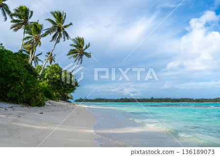 Anini Marae Beach on Huahine, French Polynesia, with turquoise waters Anini Marae Beach on Huahine, French Polynesia, with turquoise waters 136189073