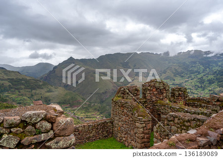 Ancient Inca ruins of Pisac nestled in the Andean mountains, Peru 136189089