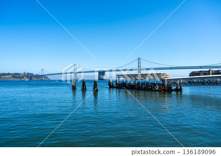 Scenic waterfront view with Oakland Bay Bridge in San Francisco Scenic waterfront view with Oakland Bay Bridge in San Francisco 136189096