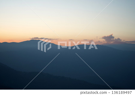Majestic Himalayan Mountain Silhouette Against Golden Hour Sunset Sky Majestic Himalayan Mountain Silhouette Against Golden Hour Sunset Sky 136189497