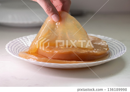 Shiny Fermentation Culture. Vivid Scene Showcasing Fermenting Probiotic Culture On Kitchen Surface Shiny Fermentation Culture. Vivid Scene Showcasing Fermenting Probiotic Culture On Kitchen Surface 136189998